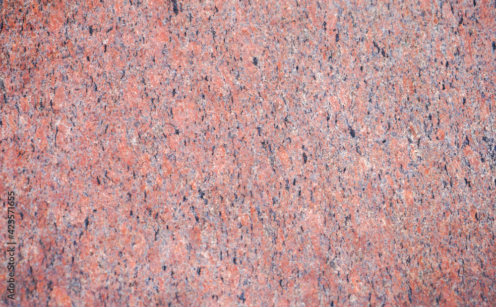 Stone structure of a stone slab, cut and processed from natural stone, photographed in daylight
Stone structure of a stone slab, cut and processed from natural stone, photographed in daylight