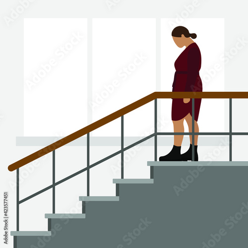 Fat female character in a dress and boots descends the stairs against the background of a wall with a window