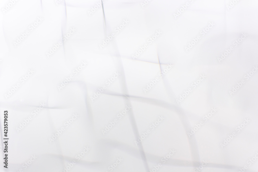 Obraz premium Surface of water. Abstract textured background in soft undertone. Natural glass texture with twist pattern of tile. Abstract gray backdrop. Monochrome banner template, social media, poster design.