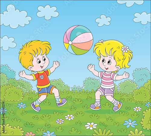 Happy little kids playing a...