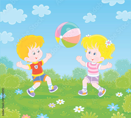 Happy little kids playing a...