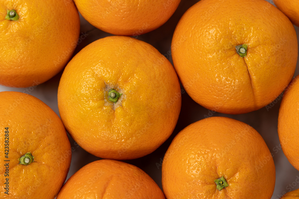Fresh oranges background. Healthy food concept Fresh oranges background. Healthy food concept