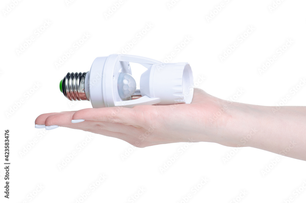 bulb holder with motion sensor in hand on white background isolation bulb holder with motion sensor in hand on white background isolation