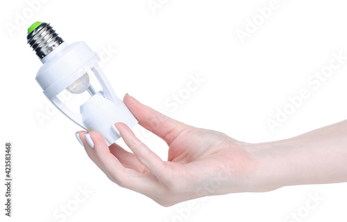 bulb holder with motion sensor in hand on white background isolation