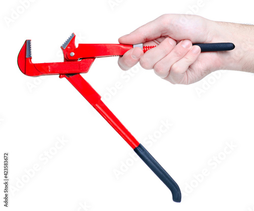 Red gas wrench in hand on white background isolation