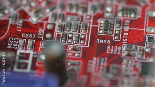 Bright red chip board moves in slow motion