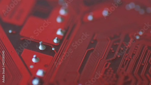 Bright red chip board moves in slow motion