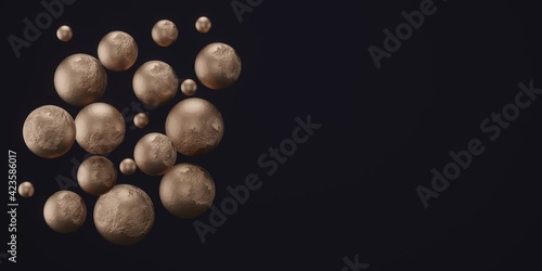 3d render of textured metallic spheres on dark background 