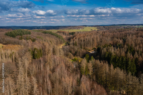 Aerial view over forests and meadows of Westerwald, Altenkirchen, Germany © Julia Hermann
