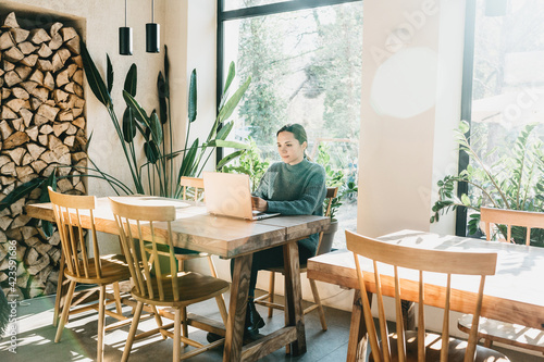 student or freelancer uses a laptop