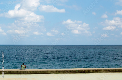 man on the pier © Adriano Vinagre