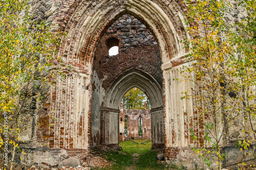 The ruins of an old abandoned church. A large ruined old building of church.