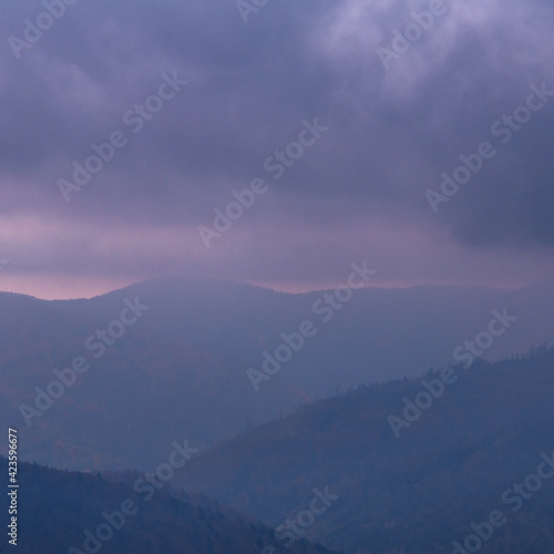 Mountains with clouds and fog in morning 