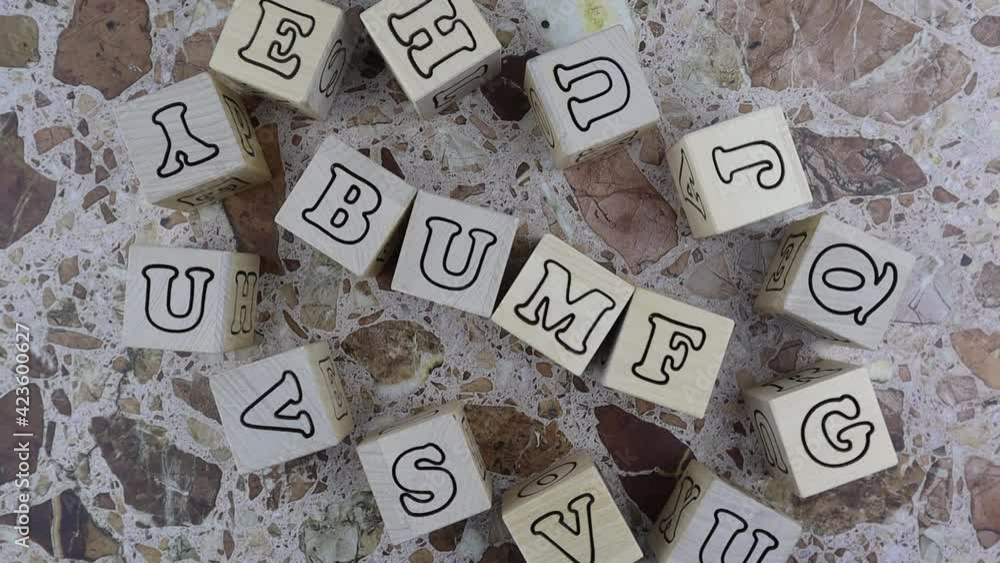 Bumf - concept with alphabet letters on wooden blocks arranged to the ...