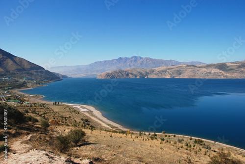 View over lake charvak reservoir east Uzbekistan photo