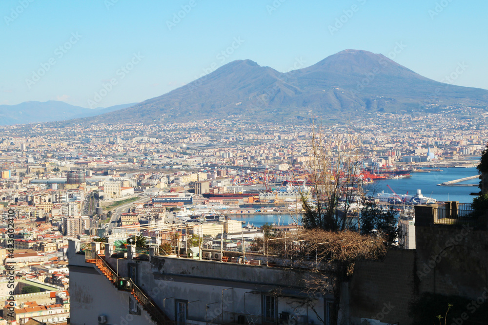 The panorama of Vesuvius volcano opening from promenade in Napoli