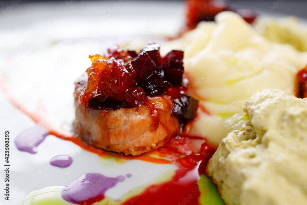 Salmon medallions with mashed potatoes and sauce Salmon medallions with mashed potatoes and sauce