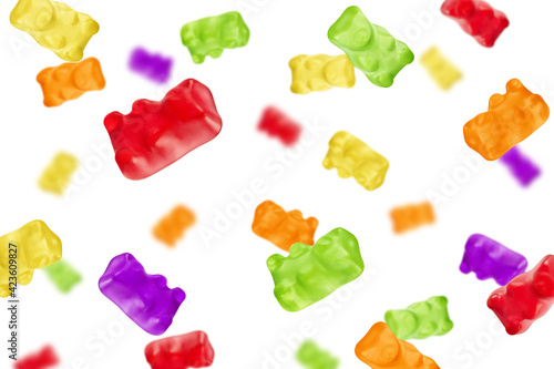 Falling Colorful jelly gummy bear, isolated on white background, selective focus photo