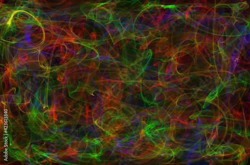 green and red smokey lines on a black background color mix
