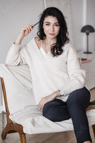 Female blogger sitting at workspace