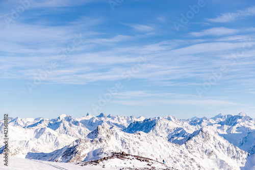 Panorama of the Caucasus mountains from Elbrus. Peaks of the sharp mountains from the highest mountain in the area. Mountains around Elbrus from a height of 4500 meters. © Михаил Шаповалов