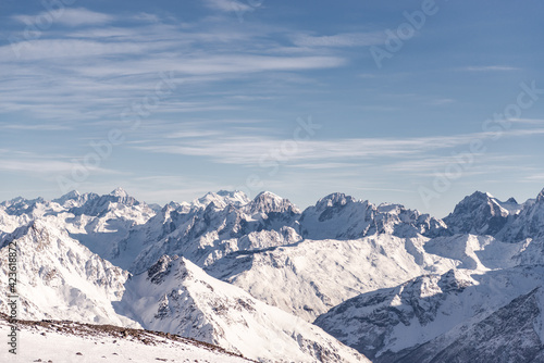 Panorama of the Caucasus mountains from Elbrus. Peaks of the sharp mountains from the highest mountain in the area. Mountains around Elbrus from a height of 4500 meters. © Михаил Шаповалов