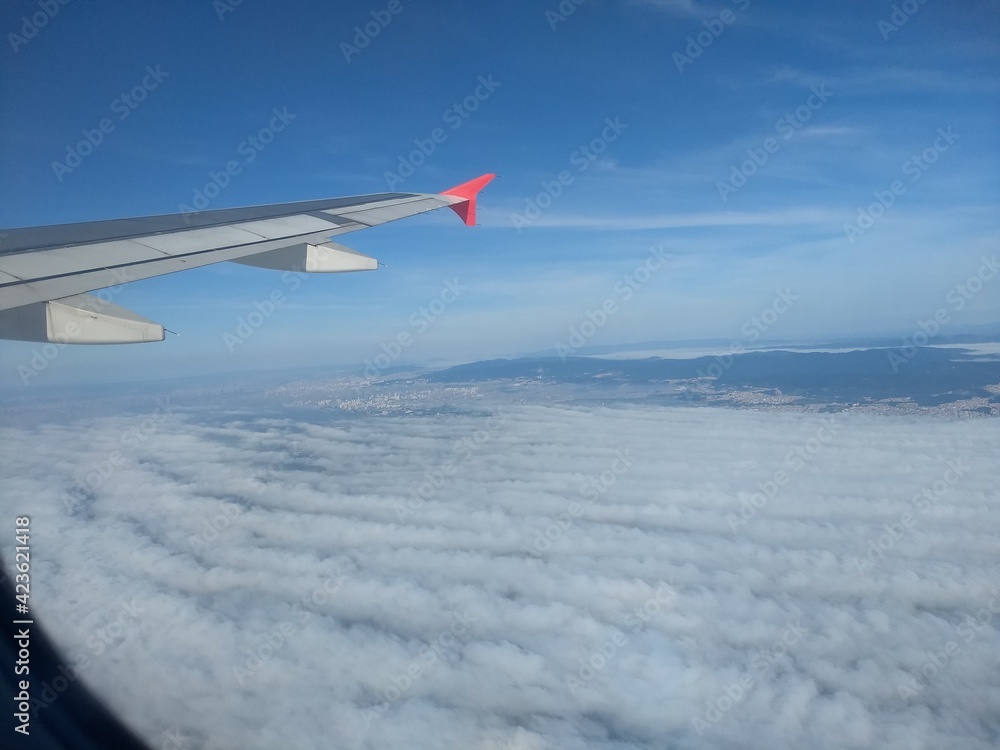 View Of The Clouds From Inside An Airplane View Of The Clouds From Inside An Airplane