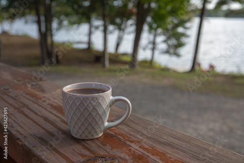 cup of coffee on lake