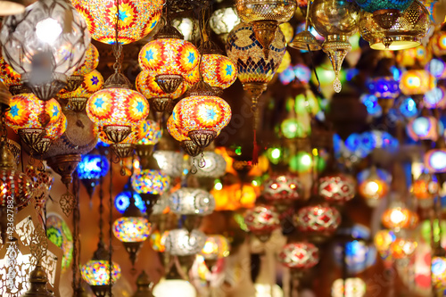 Sale of exotic Mosaic Ottoman lamps in Grand Bazaar in Istanbul  Turkey. Shopping. Gifts and souvenirs from travels.