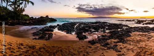 Sunset at Paako Cove aka Secret Beach With Kaho'olawe Island in the Distance, Maui, Hawaii, USA photo