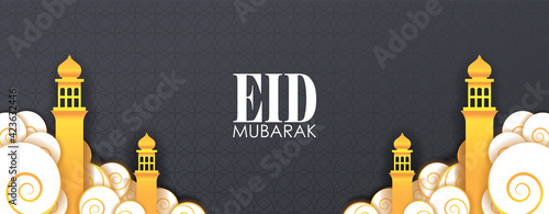 Eid Mubarak Banner. Golden Towers and Clouds on Black Background Vector Illustration for greeting card, poster and voucher.
