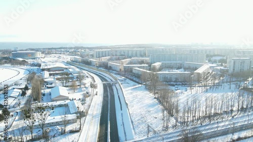 Aerial view of Gdansk cityscape covered with snow daytime sunny day  photo