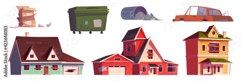 Old abandoned houses, trash bin and broken car
