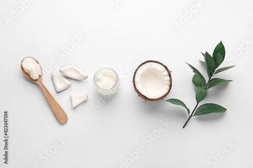 Composition with coconut oil on white background