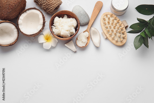 Spa composition with coconut oil on white background