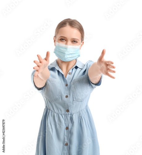 Young woman in medical mask...