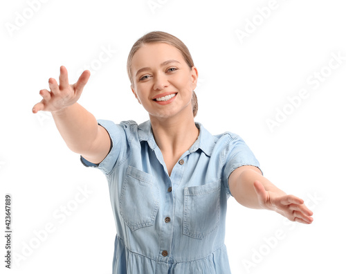 Young woman opening arms fo...