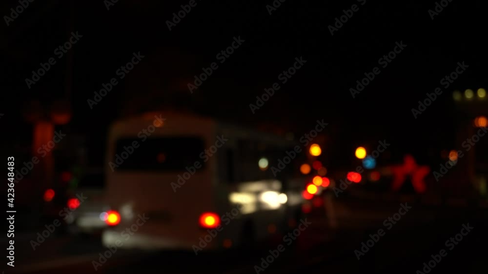 Blurred moving cars, bokeh traffic city street lights at night, abstract lights Blurred moving cars, bokeh traffic city street lights at night, abstract lights