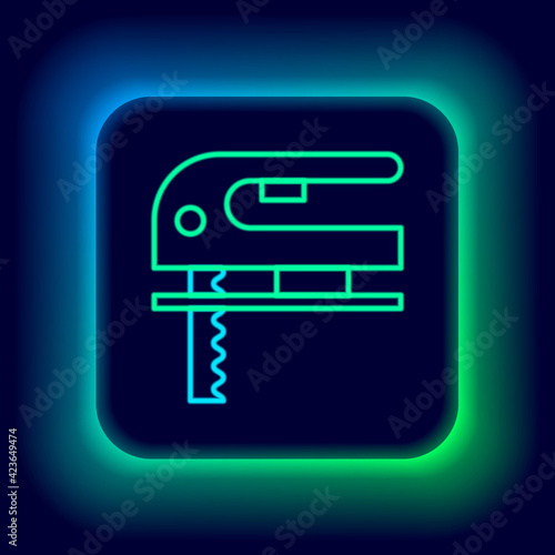 Glowing neon line Electric jigsaw with steel sharp blade icon isolated on black background. Power tool for woodwork. Colorful outline concept. Vector