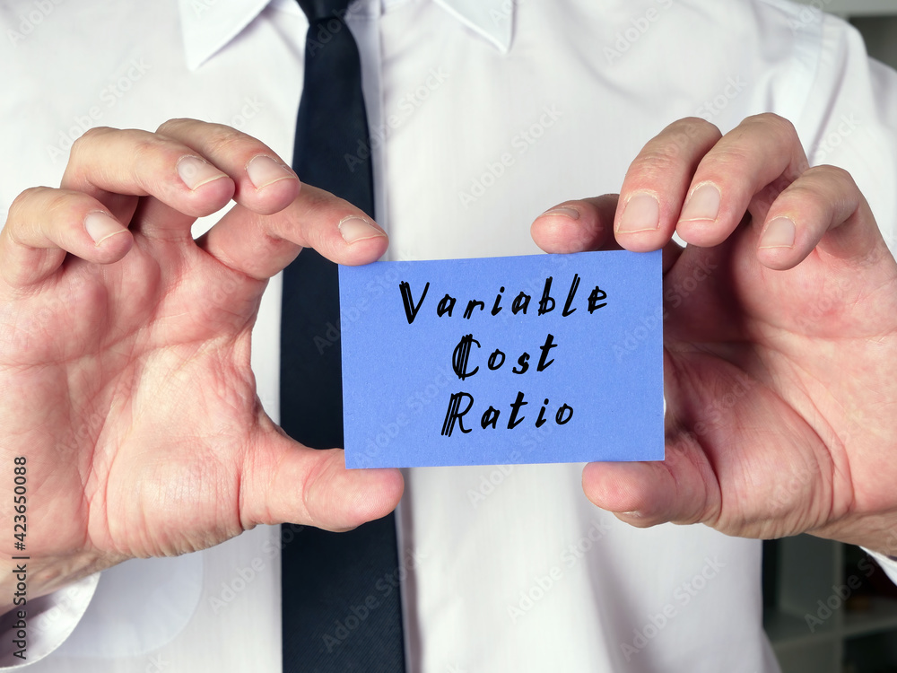 Business concept meaning Variable Cost Ratio with sign on the page. Business concept meaning Variable Cost Ratio with sign on the page.