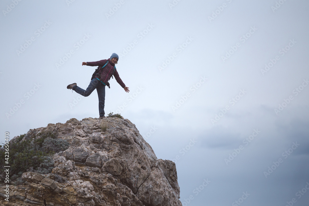silhouette of a man with a backpack on the mountain silhouette of a man with a backpack on the mountain