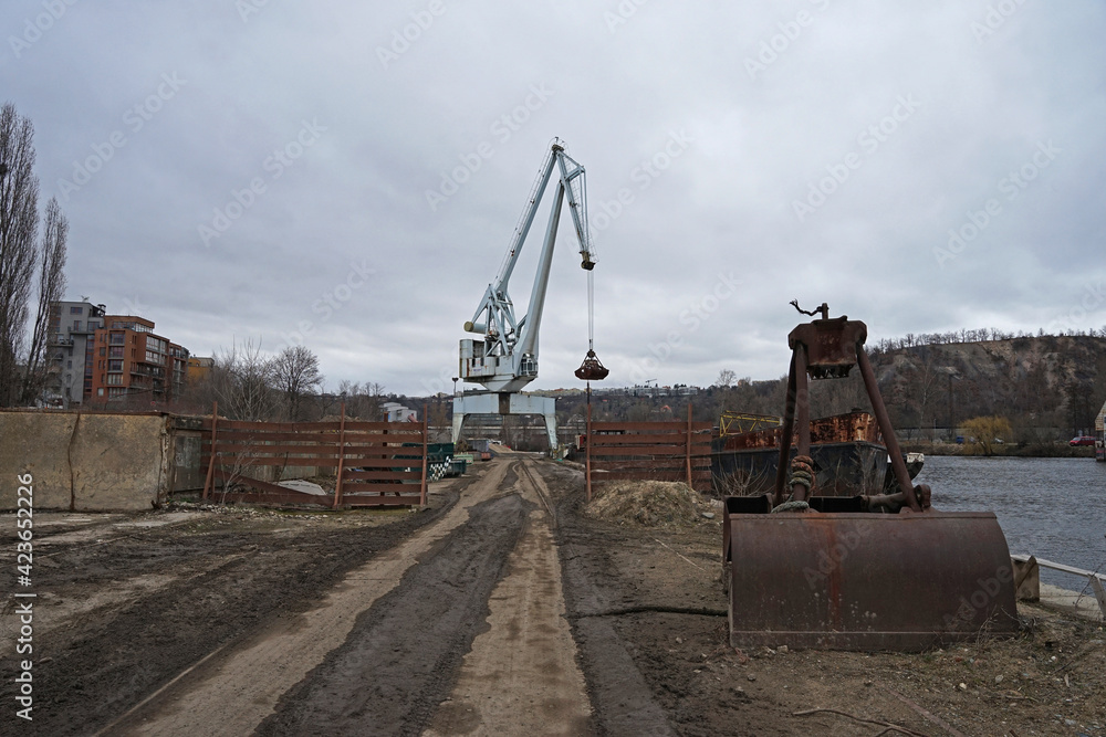 Historic crane for using for loading and unloading boats, industrial harbour in Holesovice, Prague, Czech Republic