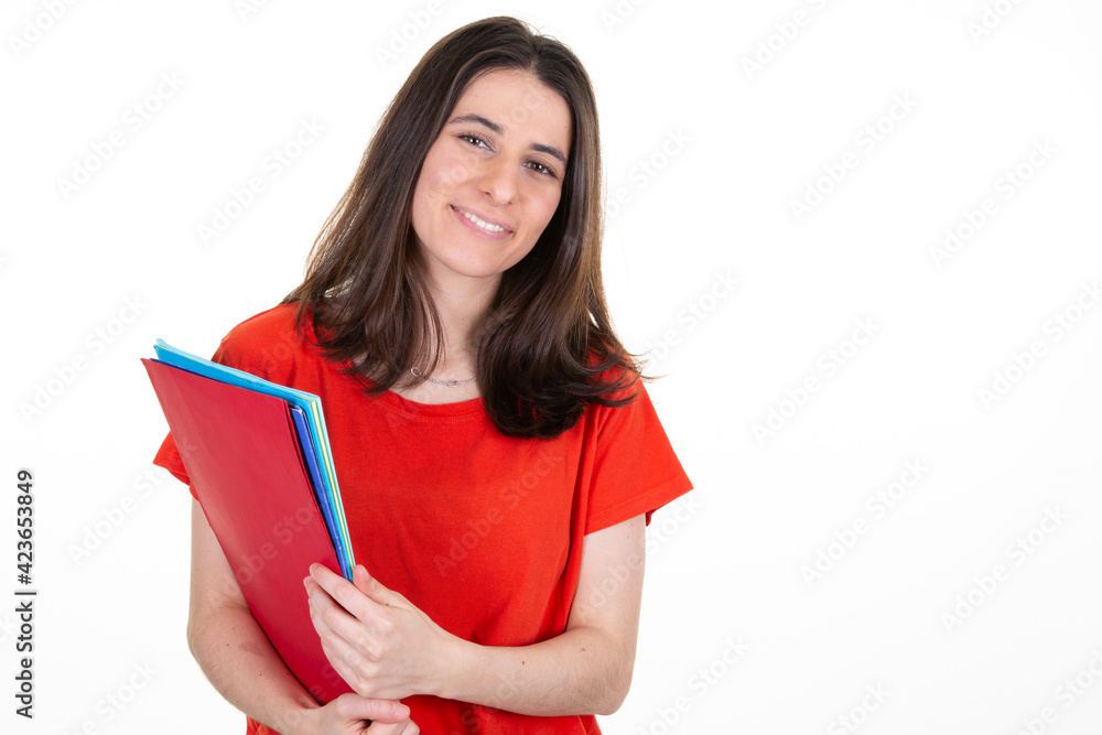 smiling happy student woman in red shirt holding folder documents looking at camera smiling happy student woman in red shirt holding folder documents looking at camera