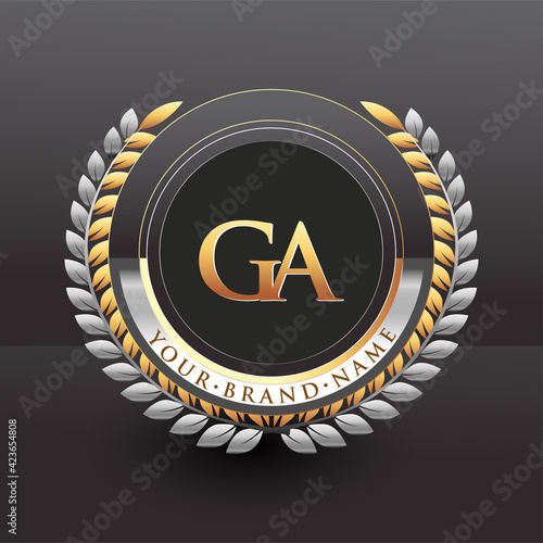 Initial logo letter GA with golden and silver color with laurel and wreath, vector logo for business and company identity. photo