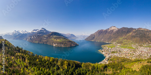 Aerial panorama of lake Lucerne and the Brunnen town in Canton Schwytz in Central Switzerland on a sunny spring day