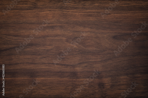 dark brown wood texture, old walnut boards. wooden panel background photo