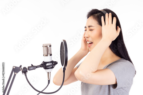 Singer female performing and singing in music studio. Singer asian woman recording song in recording studio. Superstar is recording famous album. expression face. isolated on white background