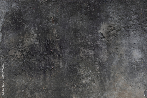 Old dirty spotty concrete wall.