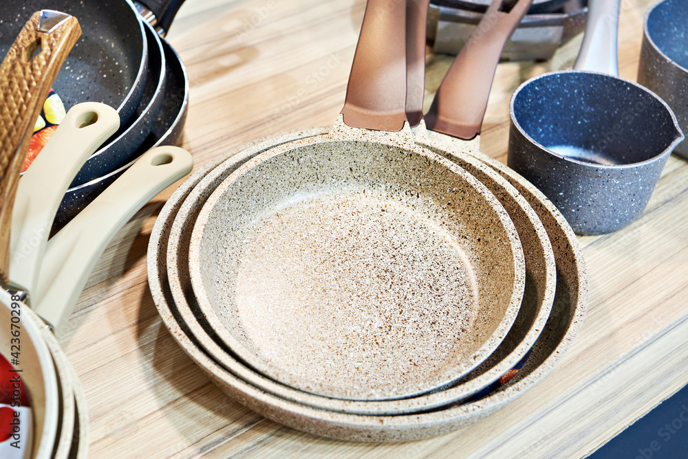 Fototapeta premium Modern nonstick pans in store