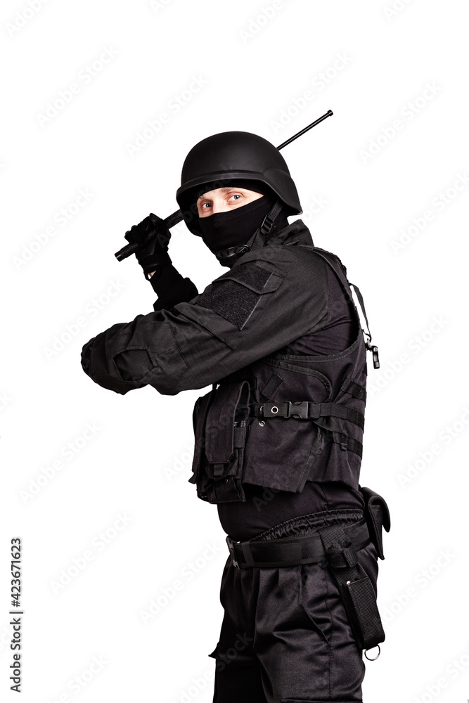 Armed police officer in protective cask with a telescopic truncheons. Isolated on white. Armed police officer in protective cask with a telescopic truncheons. Isolated on white.